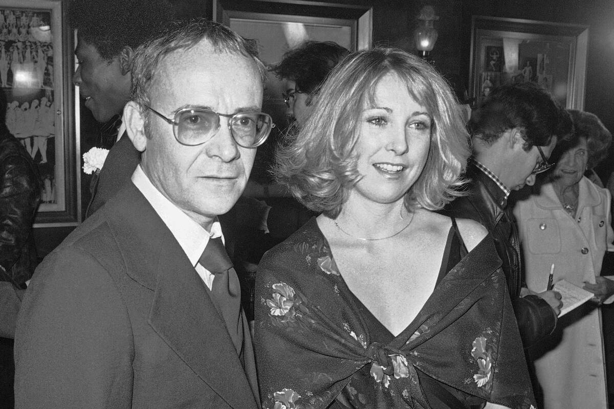 FILE - In this Nov. 15, 1977, file photo, Buck Henry and Teri Garr appear at the opening of the ...