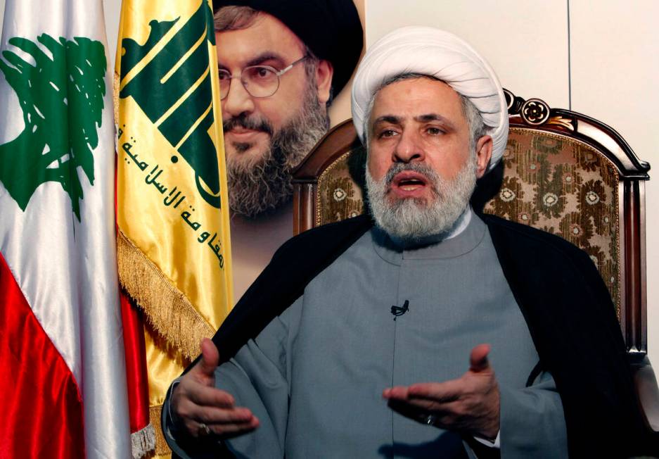 FILE - The deputy chief of Hezbollah, Sheik Naim Kassem, speaks during an interview with the As ...