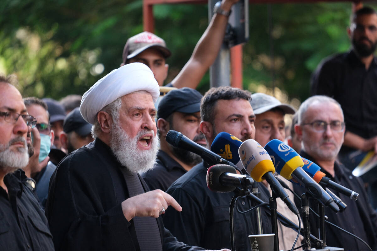 Sheik Naim Kassem, a prominent Hezbollah figure, delivers an impassioned speech during the fune ...