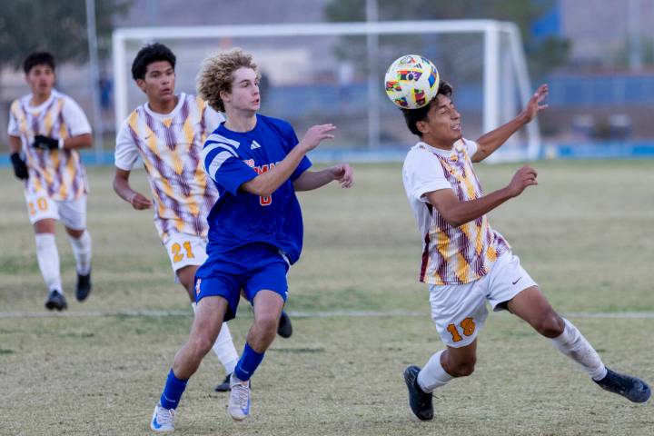 Eldorado senior Henyor Archila (18) headbutts the ball forward during the Class 5A Southern Lea ...