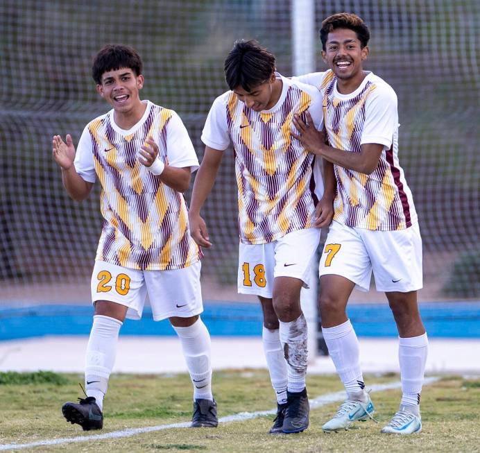 Eldorado senior Henyor Archila (18) celebrates with teammates after scoring a goal during the C ...