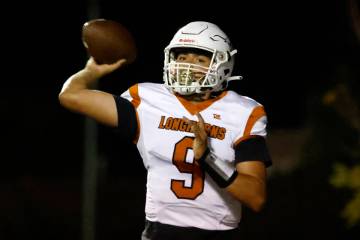 Legacy High's quarterback Aidan Crawford (9) throws a pass against Faith Lutheran during the fi ...