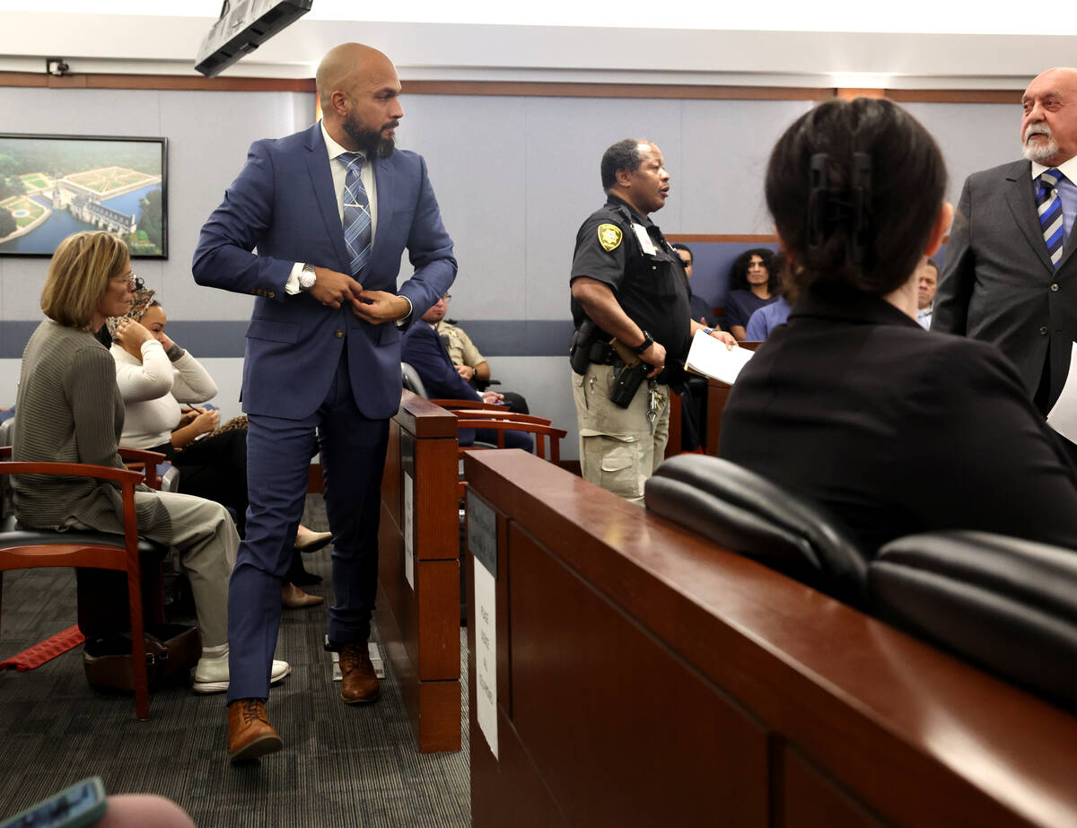 Metropolitan Police Department Sgt. Kevin Menon appears in court for a bail hearing at the Regi ...