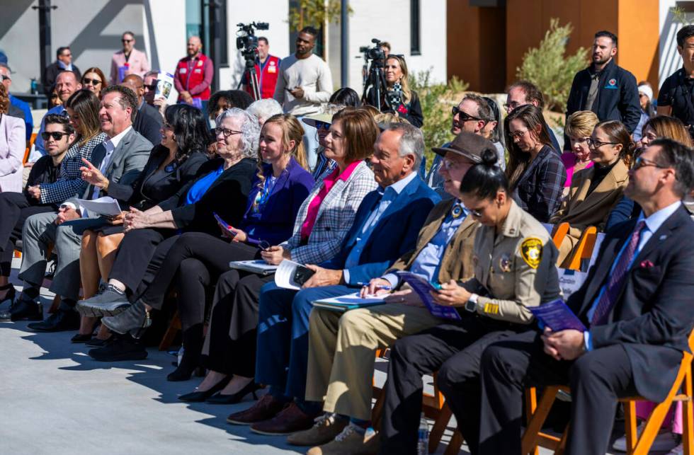 Invited dignitaries and administrators listen to a speaker during the St. Jude’s Ranch f ...