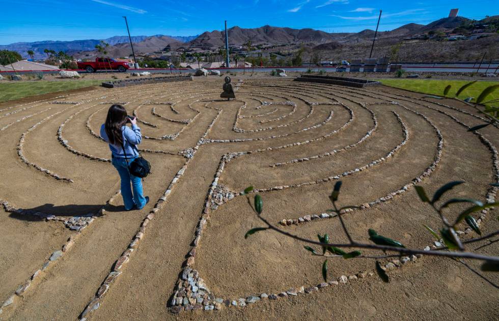 An invited guest views a labyrinth inspired by trafficking survivor and advocate Amy Ayoub duri ...