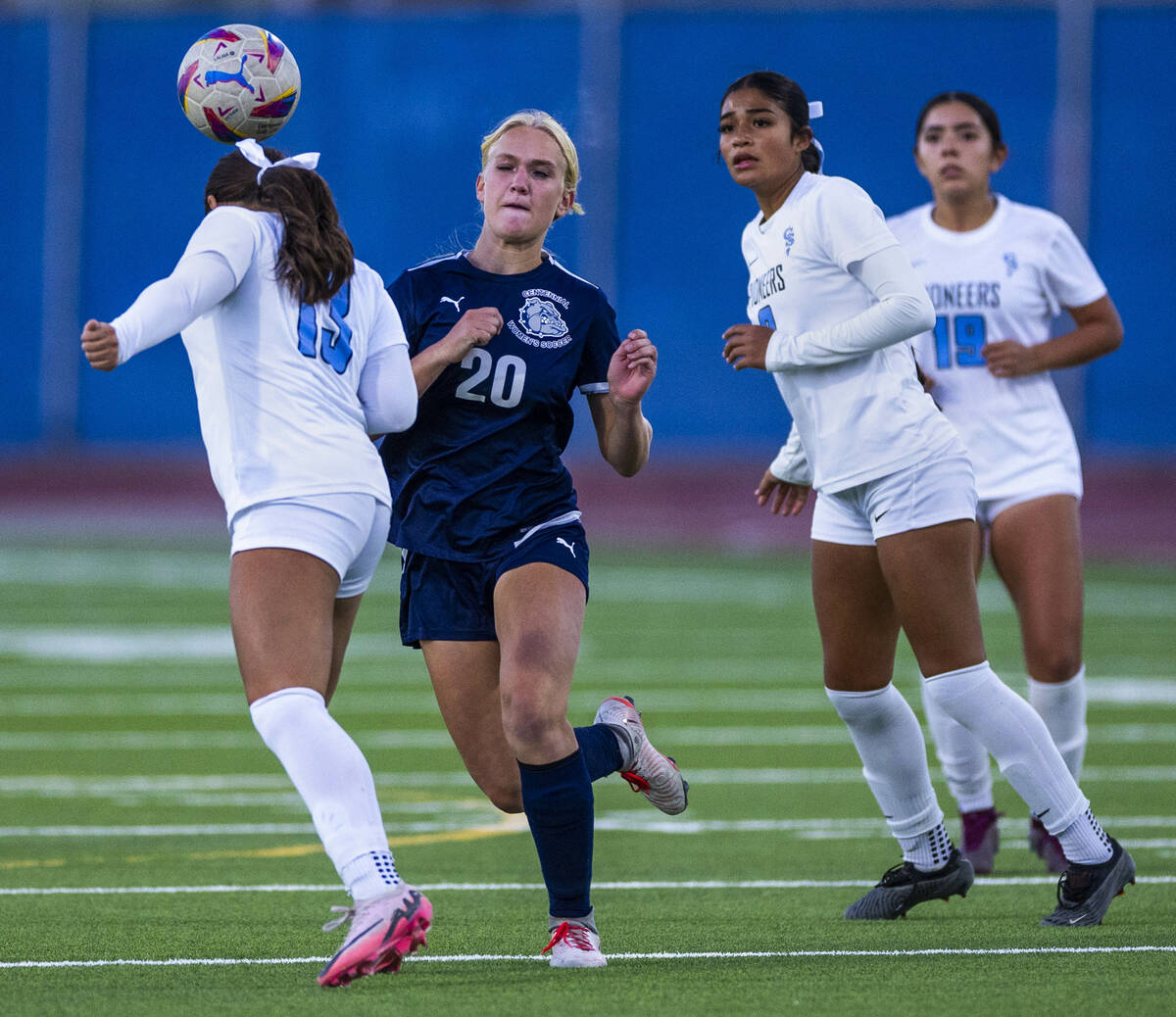 Canyon Springs defender Camila Mayorga (13) heads the ball past Centennial forward Skyley Mecha ...