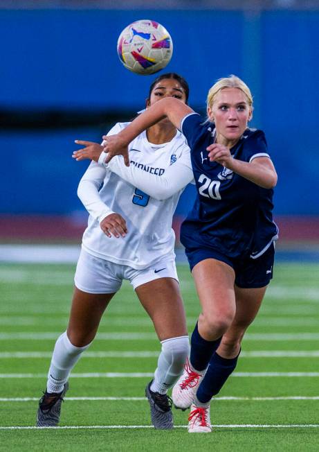 Centennial forward Skyley Mecham (20) advances up the field to catch a ball with Canyon Springs ...