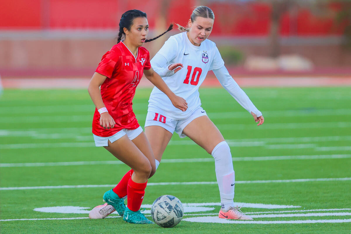 Arbor View forward Sophia Sachs (4) and Coronado midfielder Ryan Neel (10) chase the ball durin ...