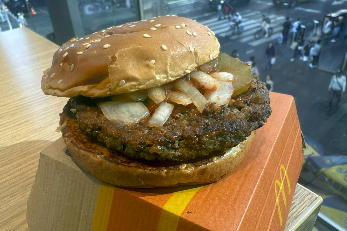 A McDonald's Quarter Pounder hamburger is shown in this photograph, in New York's Times Square, ...