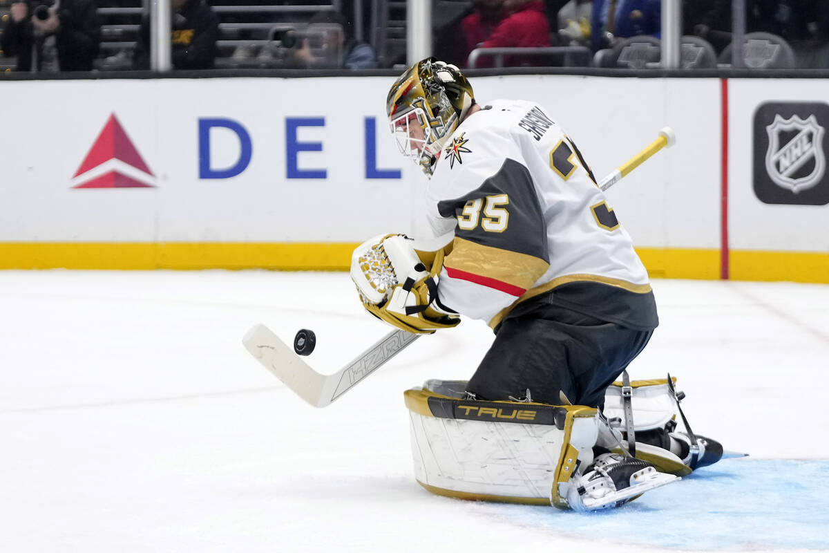 Vegas Golden Knights goaltender Ilya Samsonov deflects a shot during the second period of an NH ...