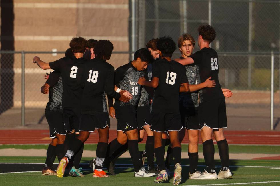 Palo Verde players celebrate after scoring against Eldorado during a Class 5A Southern League s ...