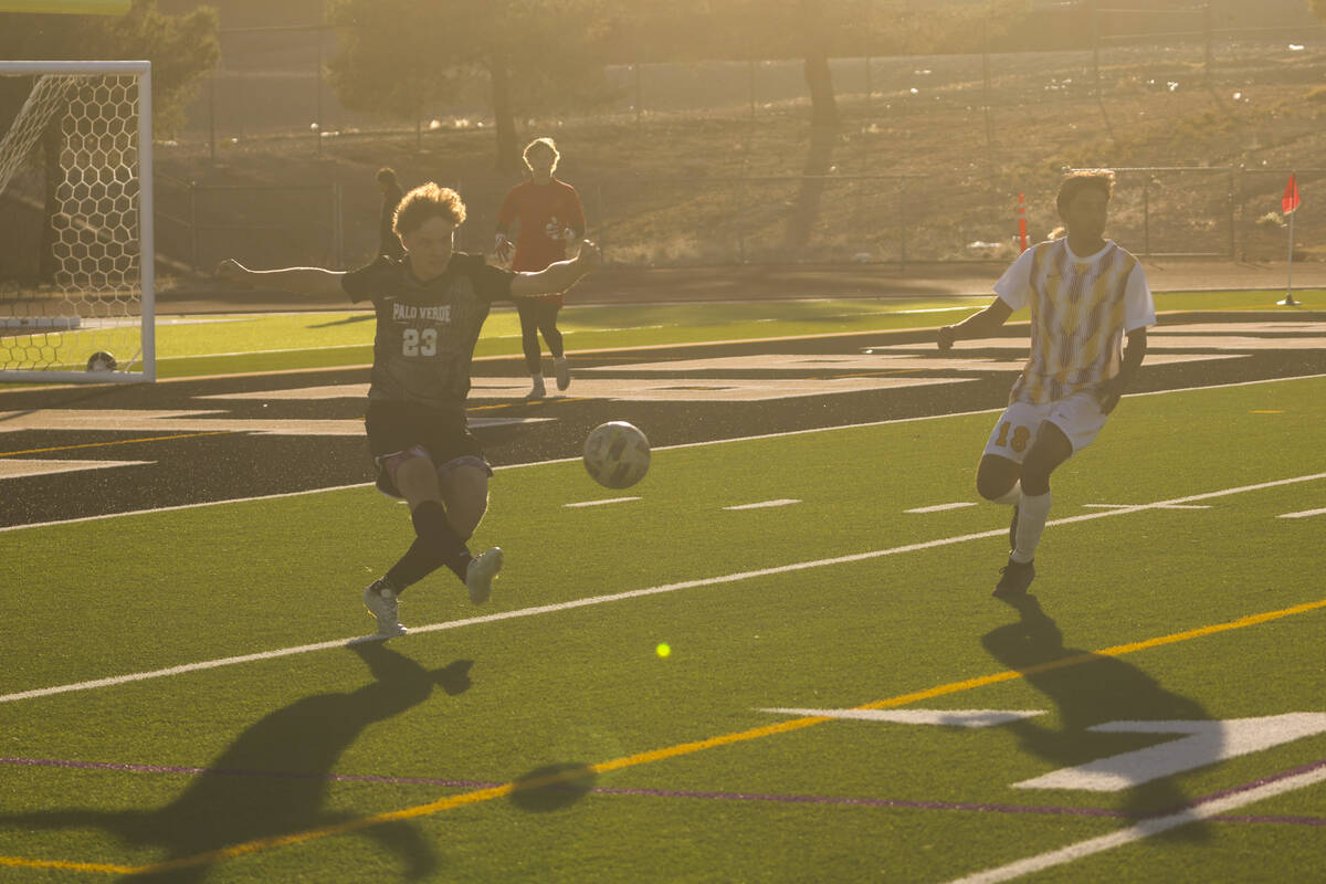 Palo Verde defender Ben Legrand (23) kicks the ball in front of Eldorado’s Henyor Archil ...