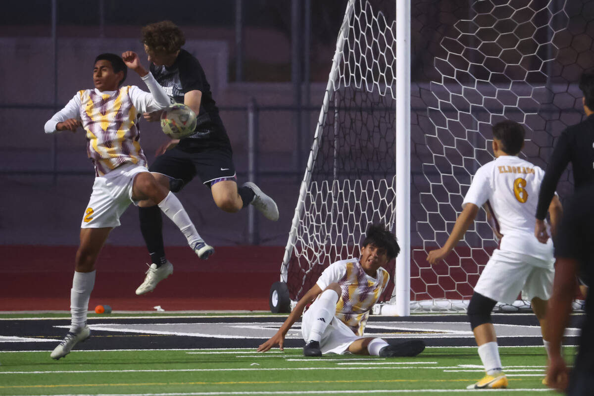 Palo Verde defender Ben Legrand, right, and Eldorado’s Josue Figueroa (2) vie for the ba ...