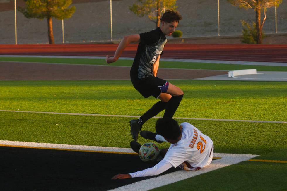 Eldorado’s Jared Macedo (21) slides to save the ball against Palo Verde midfielder Crew ...