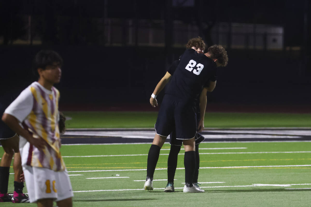 Palo Verde defender Ben Legrand (23) hugs a teammate after defeating Eldorado in a Class 5A Sou ...