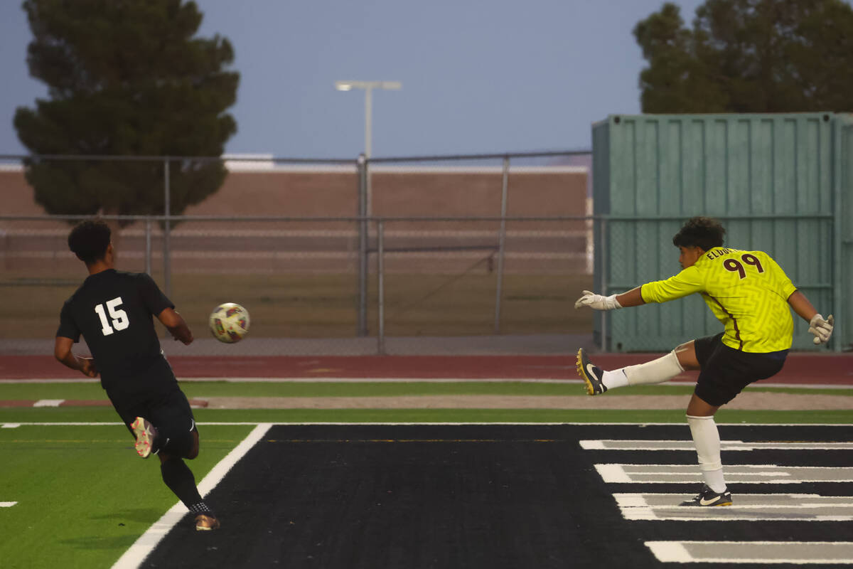 Eldorado goalkeeper Aldair Castelo (99) kicks the ball past Palo Verde Trevon Aytch (15) during ...