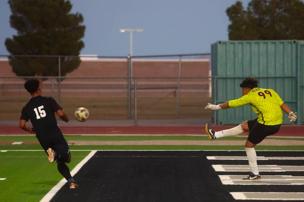 Eldorado goalkeeper Aldair Castelo (99) kicks the ball past Palo Verde Trevon Aytch (15) during ...