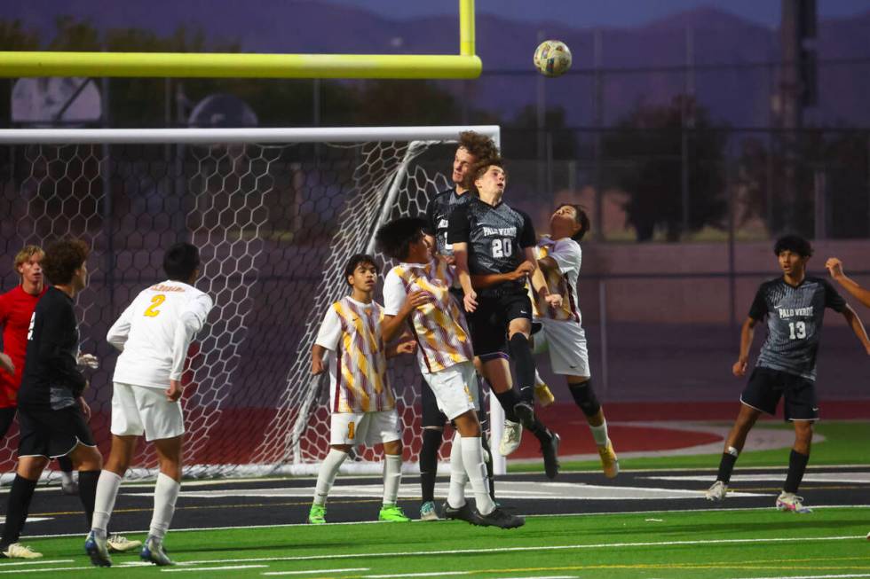 Palo Verde midfielder Crew Simon (20) heads the ball against Eldorado during a Class 5A Souther ...