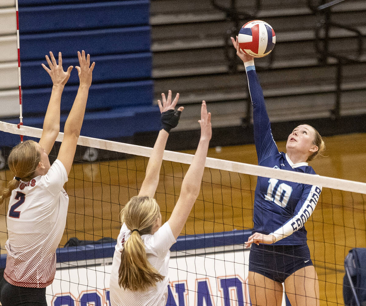 Centennial senior Abby Vlaming (10) taps the ball over the net during the 5A girls volleyball S ...