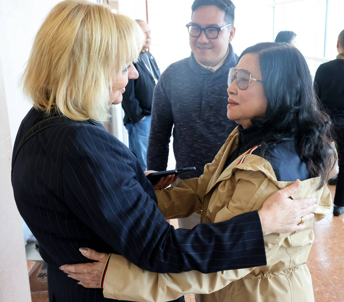 Bong Le, mother of a Khuong Nguyen who was stabbed to death by Julius Trotter, hugs Trotter&#x2 ...