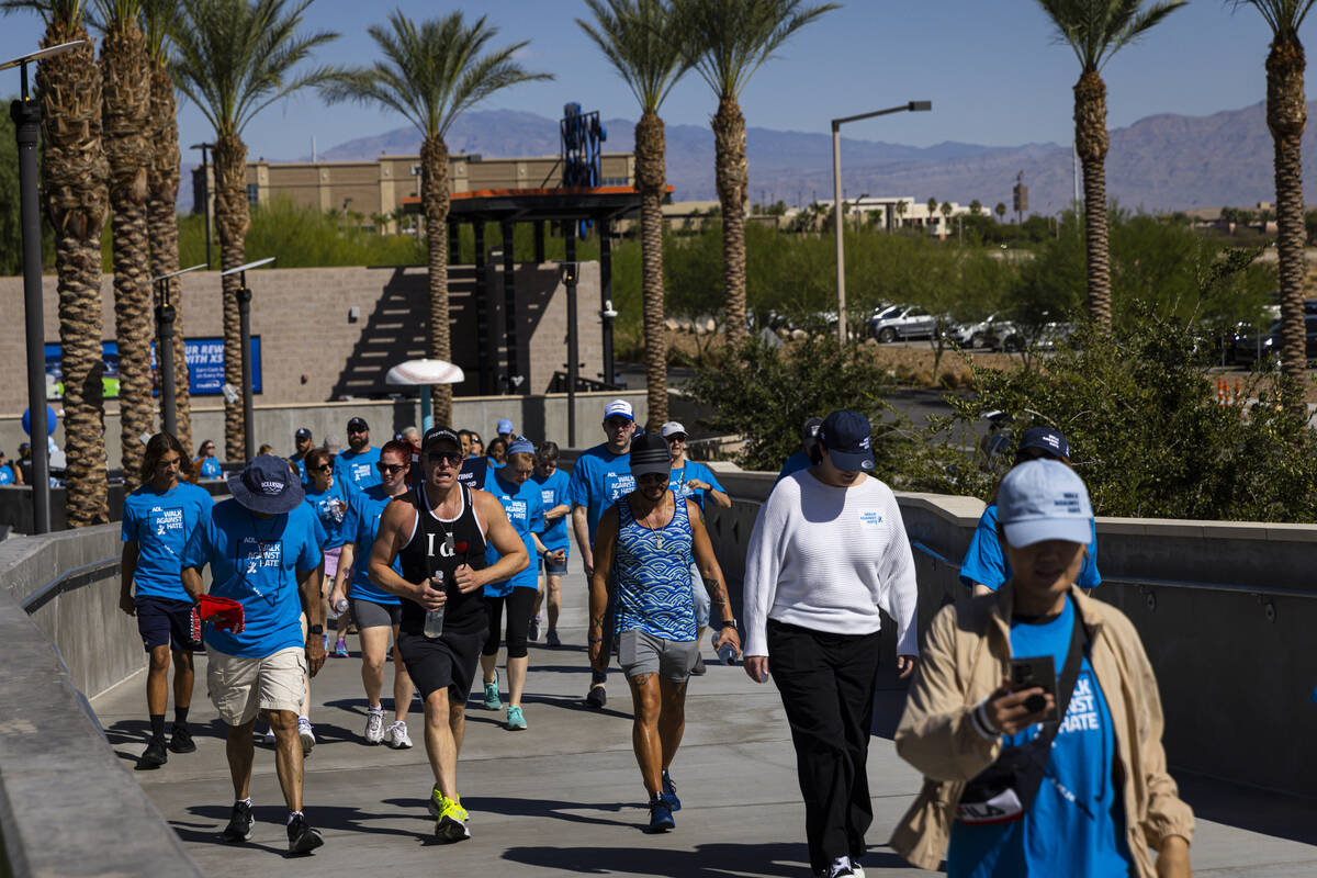 People participate in the Anti-Defamation League's Walk Against Hate at Las Vegas Ballpark in D ...