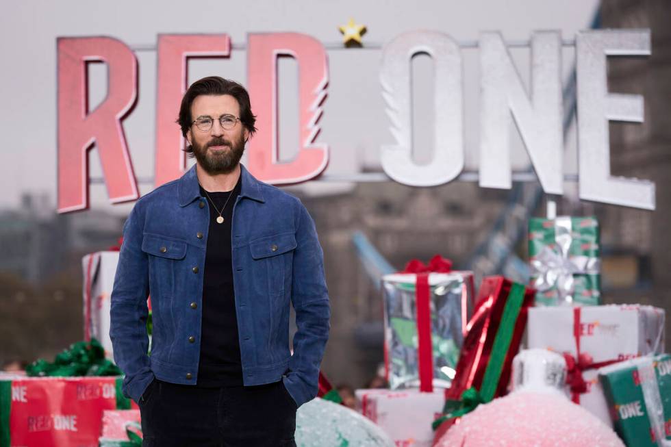 Chris Evans poses for photographers upon arrival at the moment event for the film 'Red One' on ...