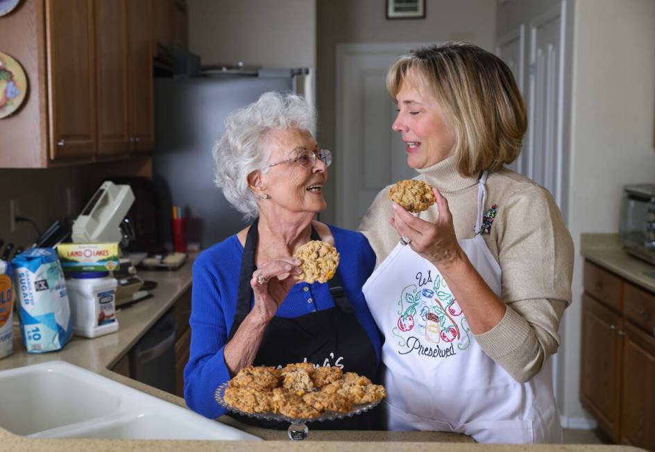 Evie Schild Hart, left, and her daughter, Sharon Willis, preside over a Christmas cookie club t ...