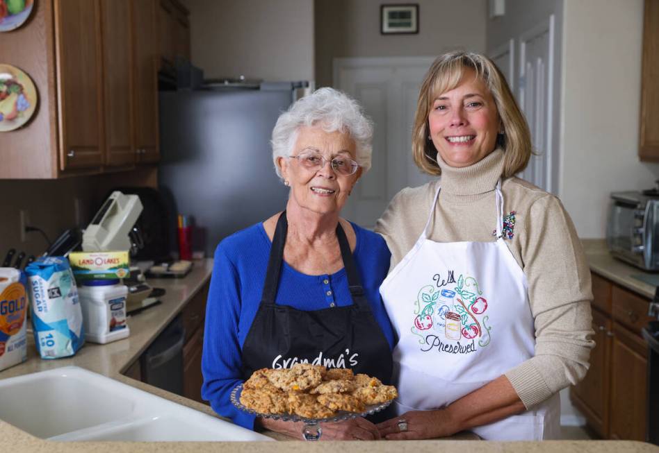 Evie Schild Hart, left, poses for a portrait with her daughter Sharon Willis, right, at Hart&#x ...