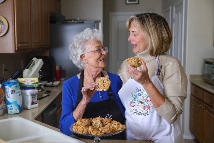 Evie Schild Hart, left, and her daughter, Sharon Willis, preside over a Christmas cookie club t ...