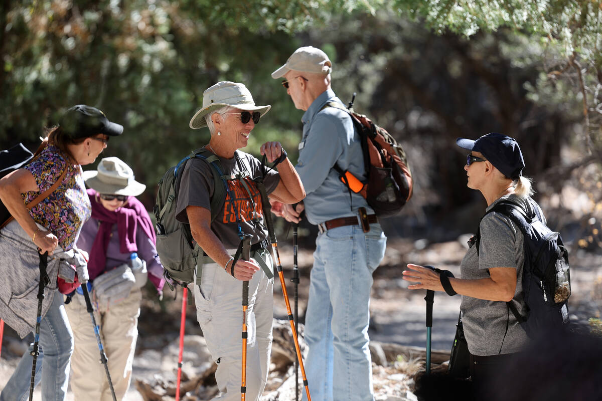 Members of the Westside Newcomers social club take a break during a hike in Fletcher Canyon on ...