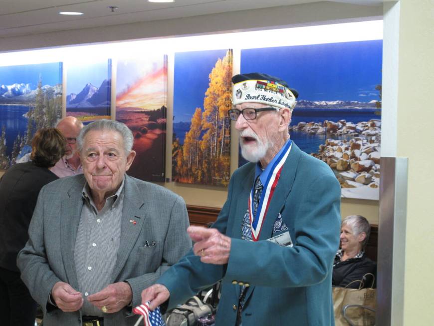 Pearl Harbor survivor Charles T. Sehe, 92, right, and Nevada Veterans Services Commissioner Chu ...