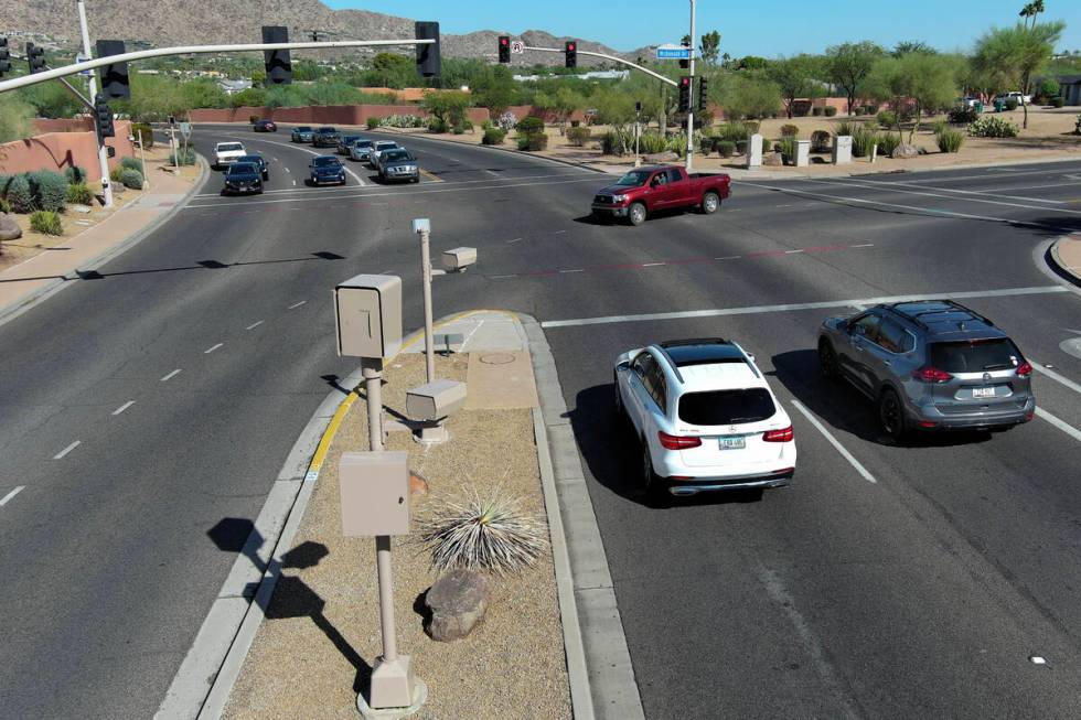 A red light camera is seen at Tatum Boulevard and McDonald Drive in Paradise Valley, Arizona Mo ...