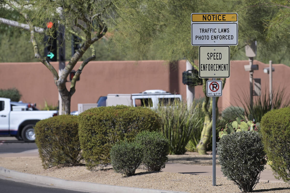 A sign warns of photo traffic enforcement at Tatum Boulevard and McDonald Drive in Paradise Val ...