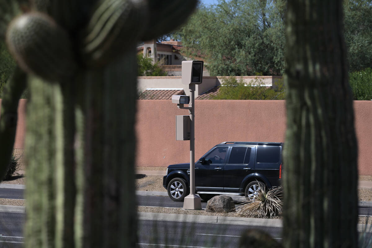 A red light camera is seen at Tatum Boulevard and McDonald Drive in Paradise Valley, Arizona Mo ...