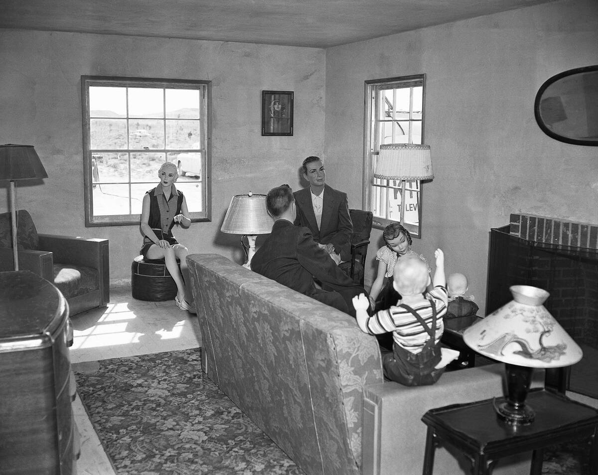 Mannequins representing an American family pictured on March 15, 1953 in the living room of Hou ...