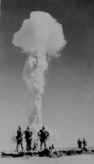 U.S. Marines watch an atomic test blast at the Nevada Proving Ground northeast of Las Vegas on ...