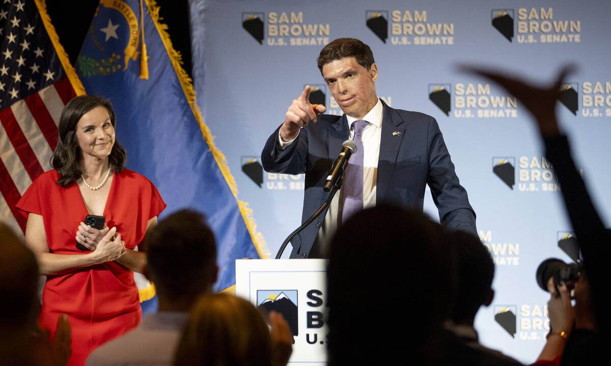 Republican senatorial candidate Sam Brown, right, gives a celebratory speech during his Electio ...