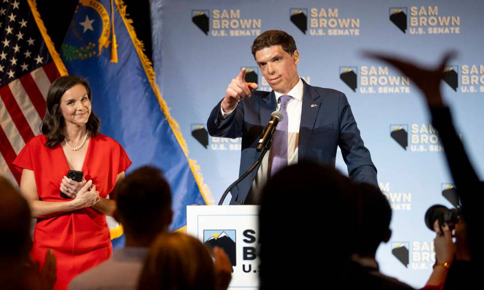 Republican senatorial candidate Sam Brown, right, gives a celebratory speech during his Electio ...