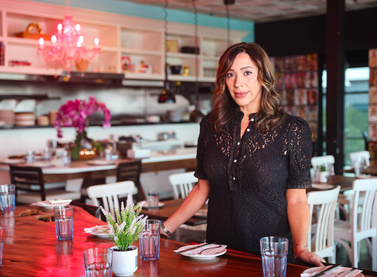 Tyra Bell-Holland, owner of The Stove, poses for a portrait at her casual breakfast and brunch ...