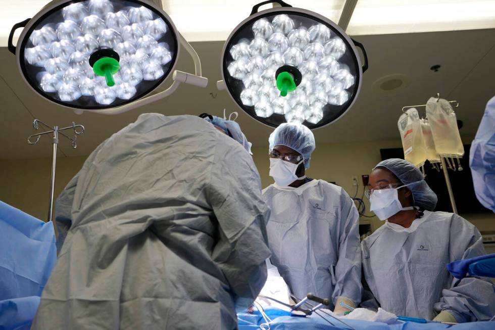 Meharry Medical College students watch as the liver and kidneys are removed from an organ donor ...