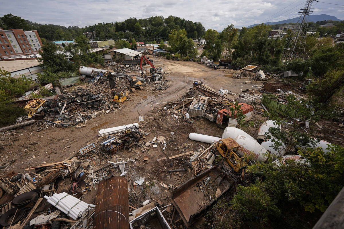 Debris is visible in the aftermath of Hurricane Helene, Sept. 30, 2024, in Asheville, N.C. (AP ...