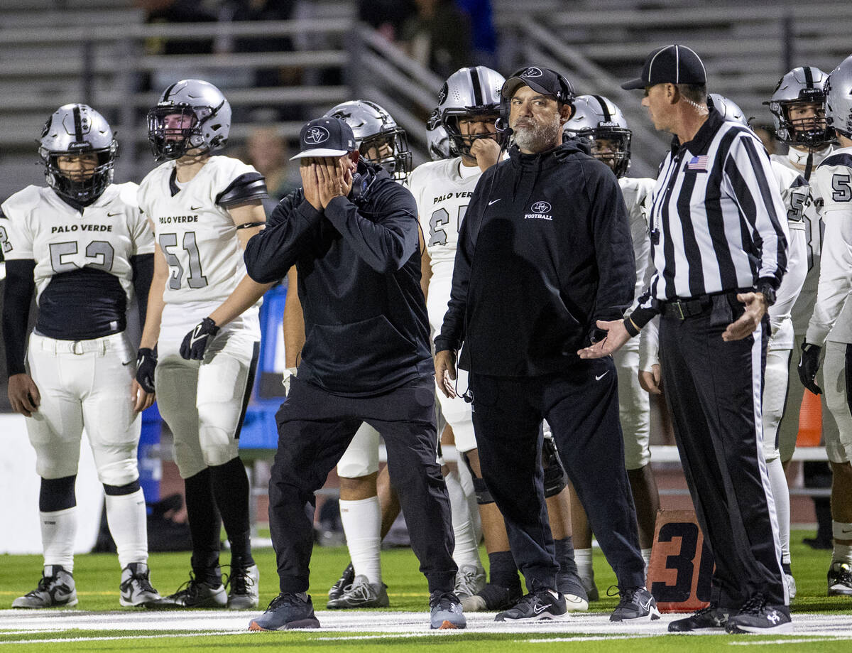 Palo Verde Head Coach Joe Aznarez, left, reacts to a penalty call during the 5A Division II Sou ...