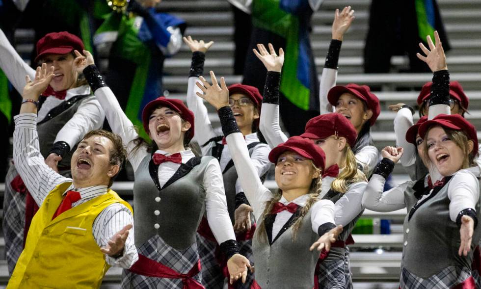 Green Valley Color Guard members cheer on the defense during the 5A Division II Southern League ...