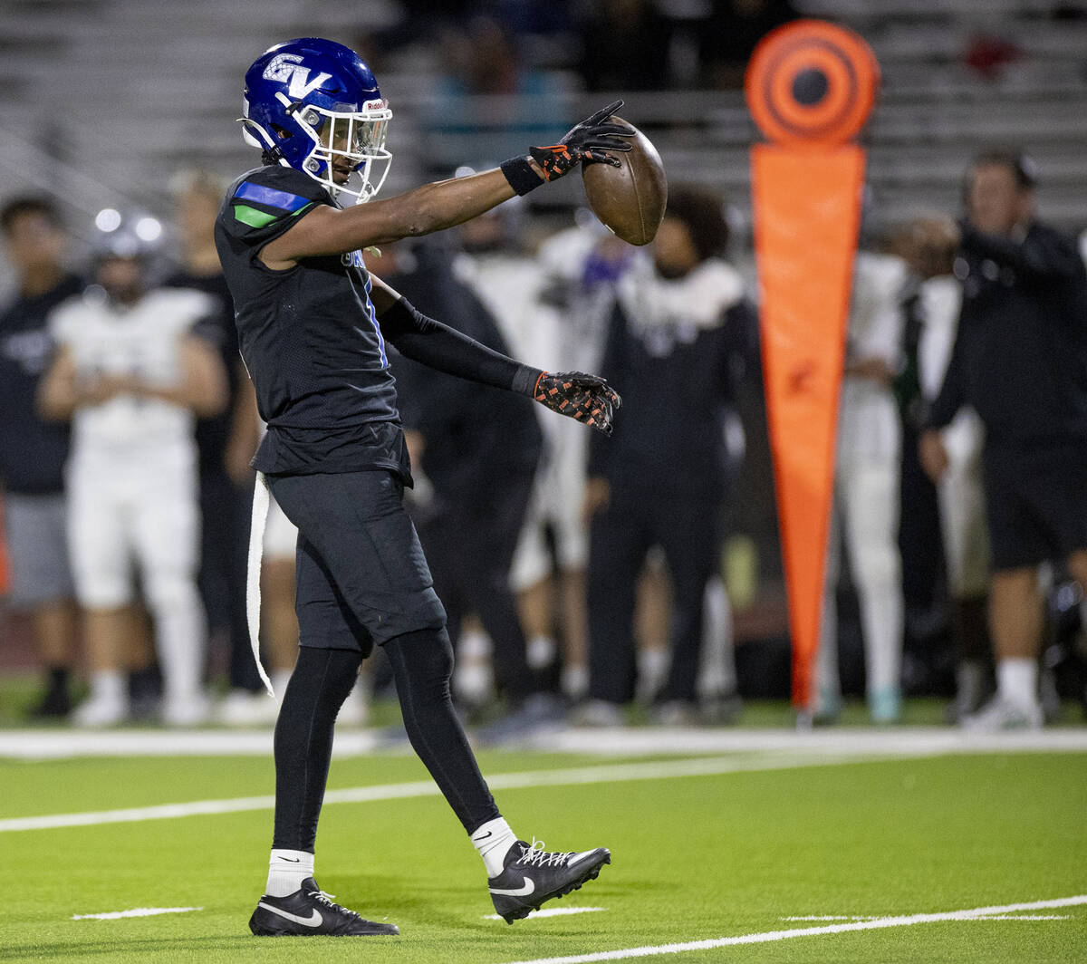 Green Valley senior Trey Glasper (1) celebrates making a first down during the 5A Division II S ...