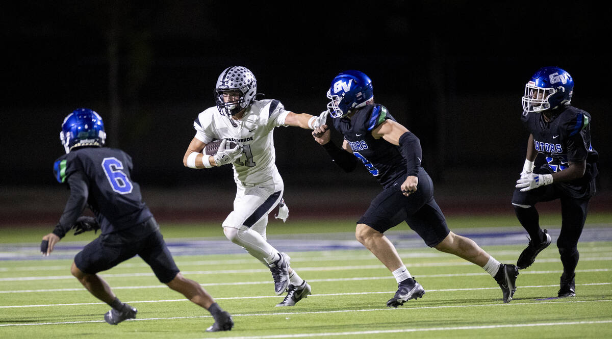 Palo Verde senior Colten Thresher (11) avoids defenders during the 5A Division II Southern Leag ...