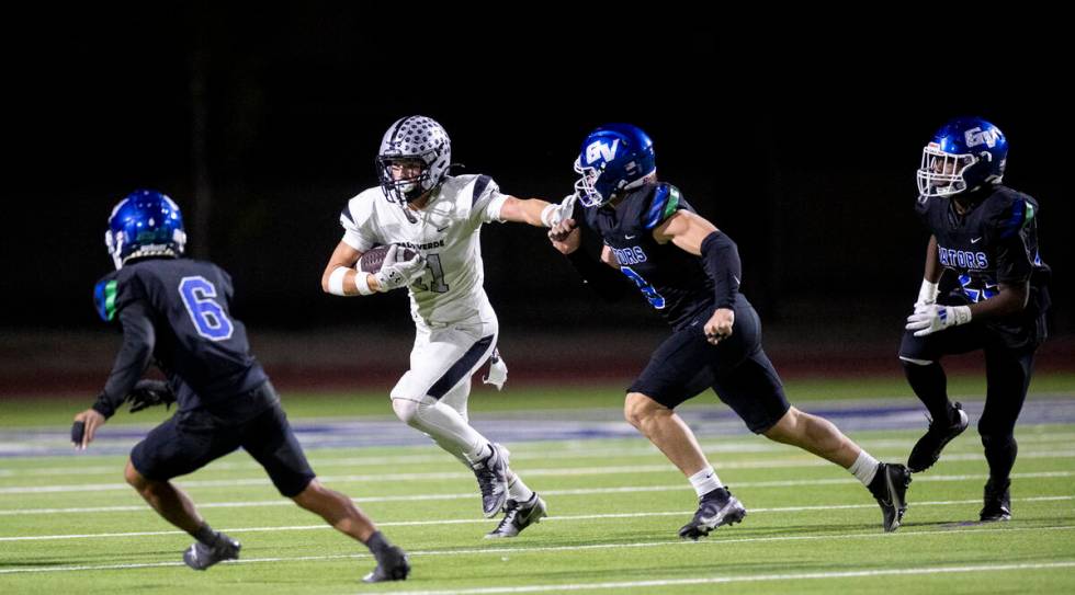 Palo Verde senior Colten Thresher (11) avoids defenders during the 5A Division II Southern Leag ...