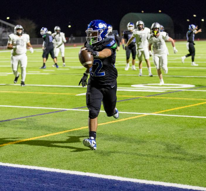 Green Valley running back Cris Dalina (22) runs into the end zone for a touchdown during the 5A ...