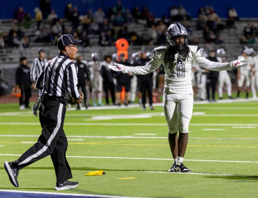 Palo Verde senior Jakari Burrell (10) reacts after a flag is thrown during the 5A Division II S ...