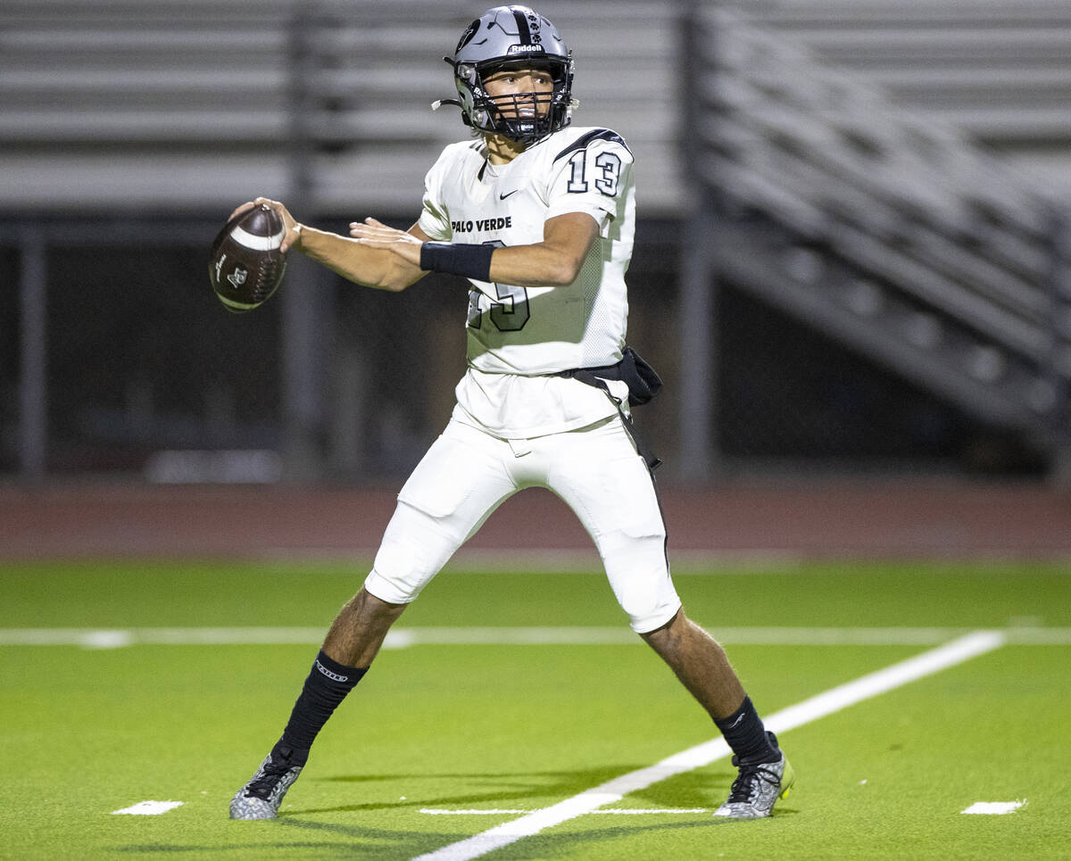 Palo Verde senior Dawson Perkes (13) looks to throw the ball during the 5A Division II Southern ...