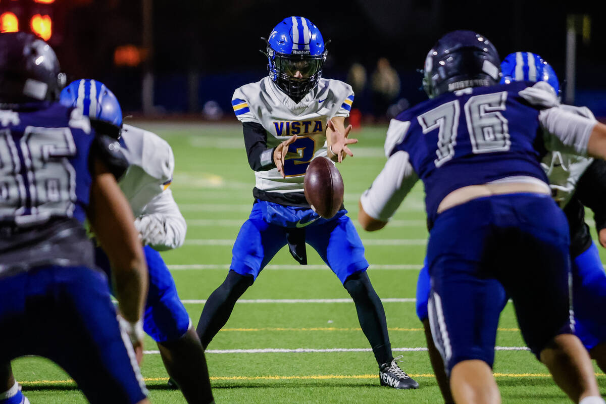 Sierra Vista quarterback Charles Butera (2) is hiked the football as Sierra Vista attempts a tw ...